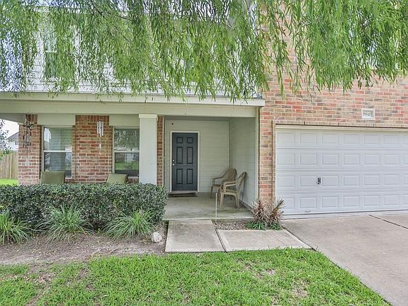 Large front patio. Plenty of shade from the tree!