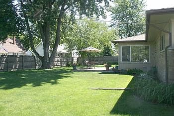 Double city lot with private fenced yard