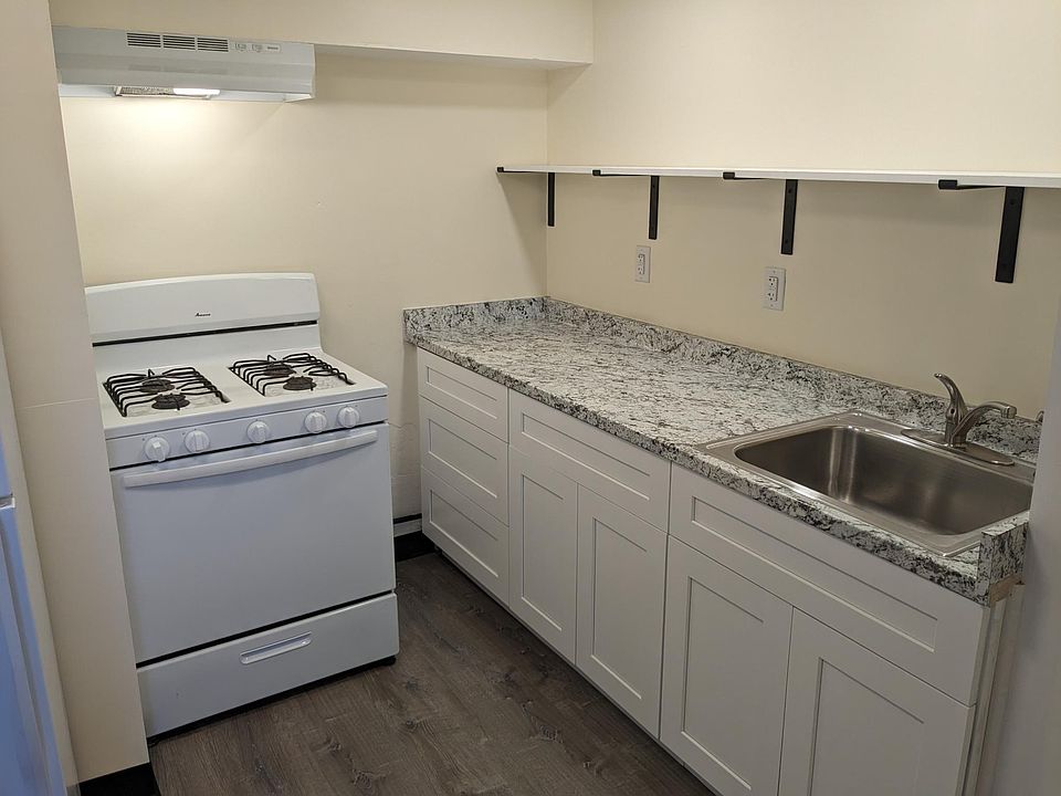 Gas stove and new cabinets.