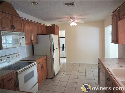 Kitchen From Dining Room