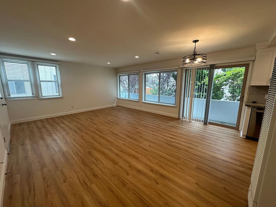 Open Living Area with large dual paned windows throughout that keep the unit insulated and quiet.
