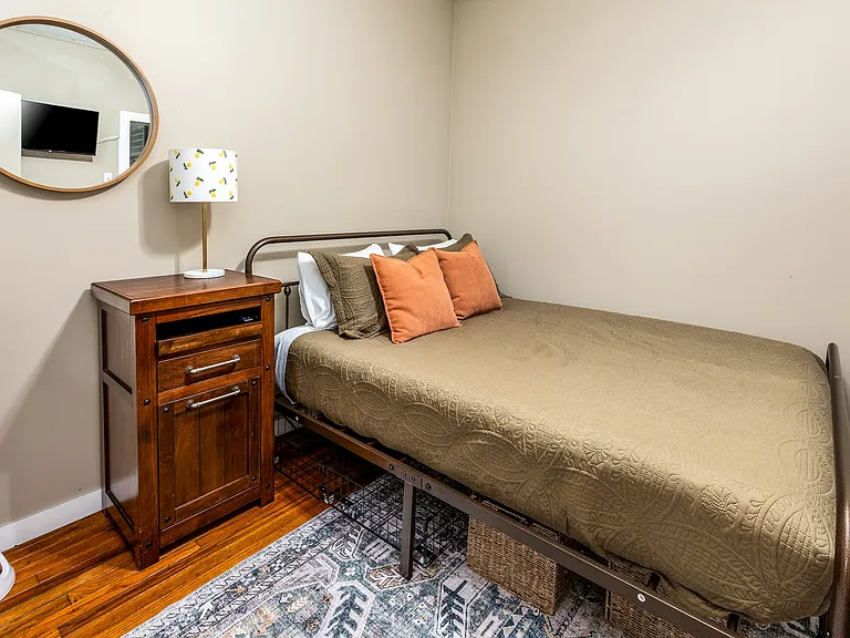 Bedroom #2 with storage boxes under the bed for your items.