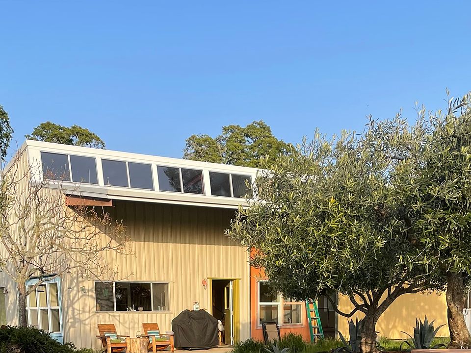 Front of house, faces garden and expansive views West.