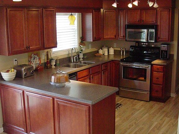 newly remodeled kit w/ cherry cab, stainless steel appliances