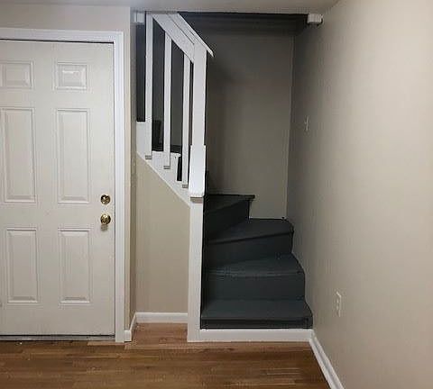 Denison 3 stairs to upper level from living room