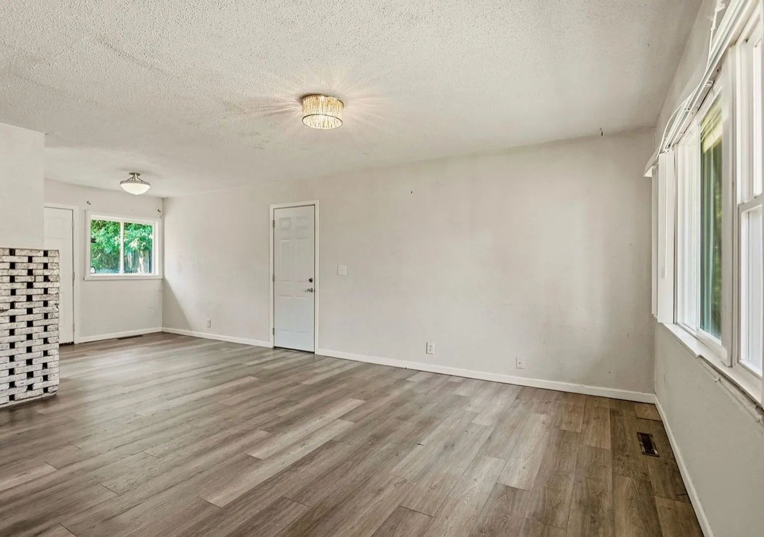 Freshly Updated 3-Bedroom Home with New Flooring! — Photo 3