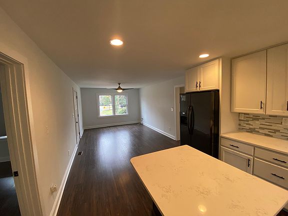 Open floor plan. Plenty of room for a large couch or sectional, tv stand, kitchen table, etc.