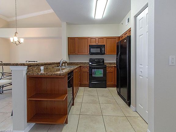 5th image of 10121 Villagio Palms Way Unit 203