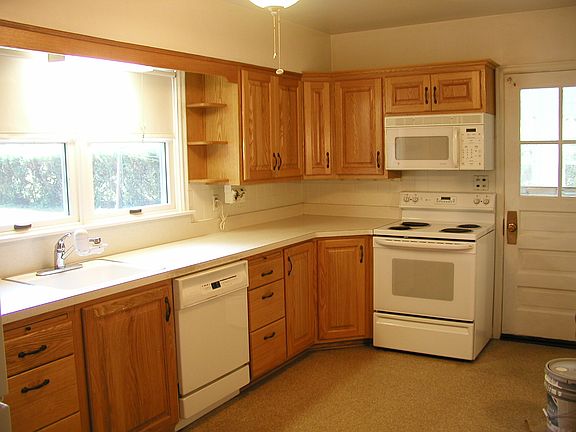 Kitchen looks into back yard