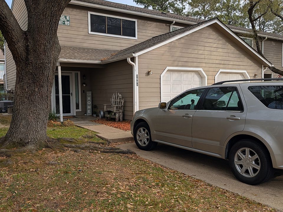 1 Car attached garage with a visitor parking in front of the house