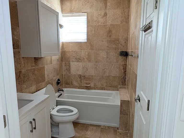Full tile upgraded bathroom.