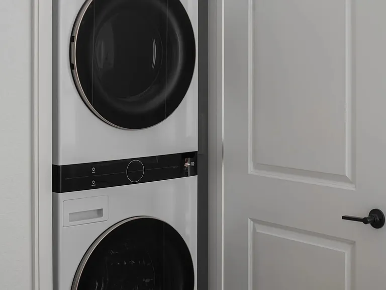 In-home washer and dryer thoughtfully tucked away_so laundry day fits seamlessly into your routine.