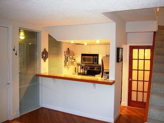 Kitchen, Half Bath, Stairs to 2nd floor