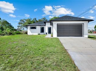 100 Parish DR, LEHIGH ACRES, FL 33974