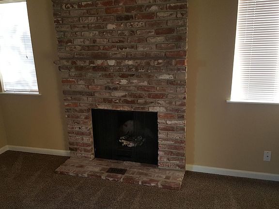 Real fireplace with heat register