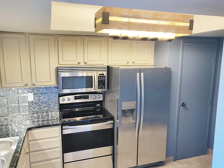 3550 S Harlan St #124 — Photo 1
