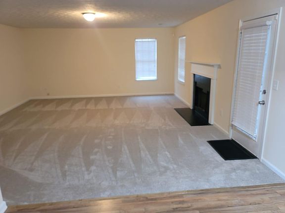 Spacious Family Room With Fireplace for your relaxation, and cozy days/nights.