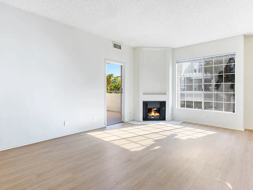 Living Room with Fireplace and Hard Surface Flooring