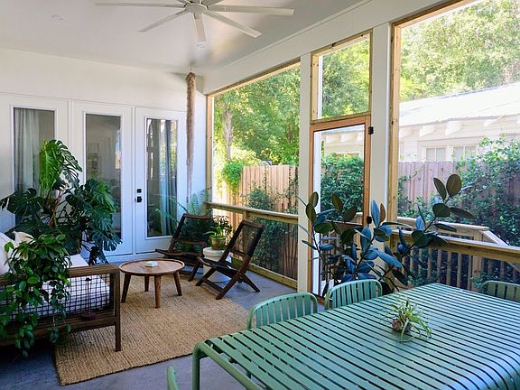 Large screened-in porch for indoor/outdoor living.