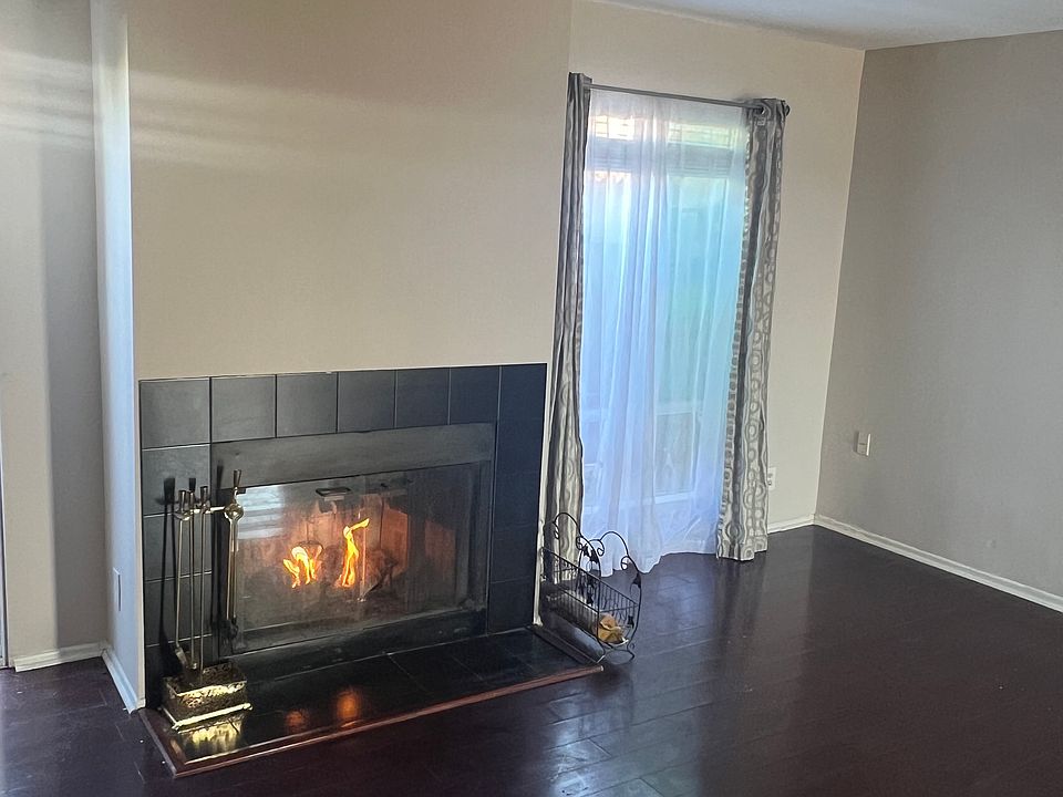 Living room and fire place. Fireplace also gas burning
