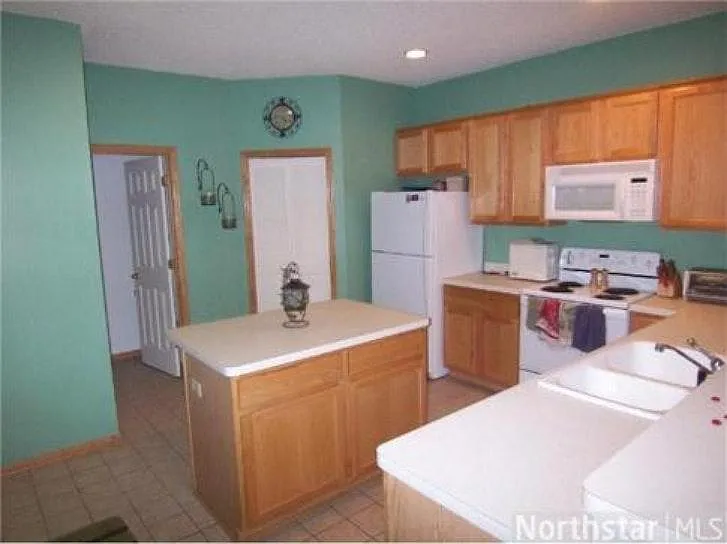 Granite counters are not shown, Old pictures.