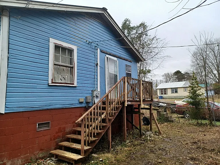 Back view of house with deck