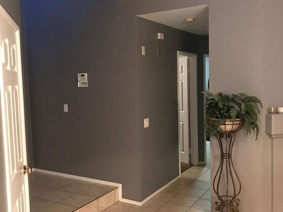 Downstairs with 3rd bedroom off this hallway