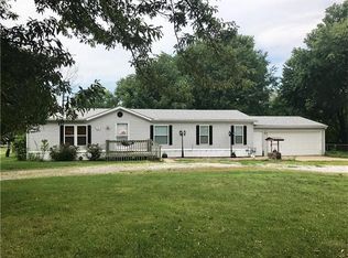 1302 N Ward Rd, Raymore, MO 64083