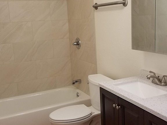 large bath with tub and shower