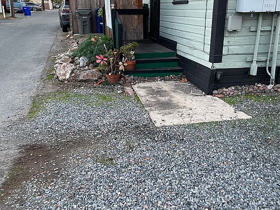 4661 Date. Ave. Is located in the alley off of Lemon Ave. Artist cottage with private yard & off street parking. It also has its own water meter.