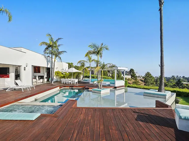 Palm trees and paradise! The outdoor area features majestic palms that lend an exotic touch to your escape.