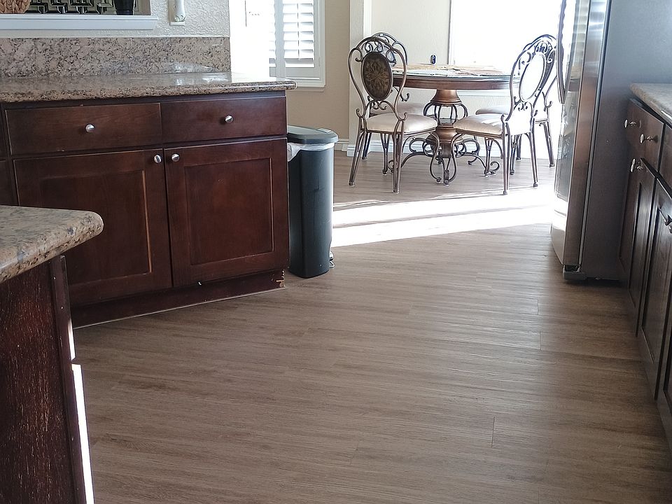 Kitchen area with view into pool area