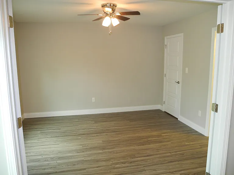 Fourth bedroom accessed from dining room