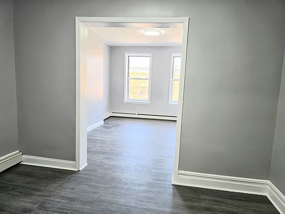 5th image of 56-46 Myrtle Ave #3