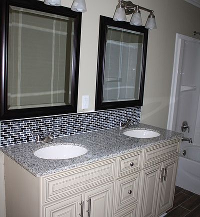 Master Bath with Granite Countertop
						:
						Features Barn Door