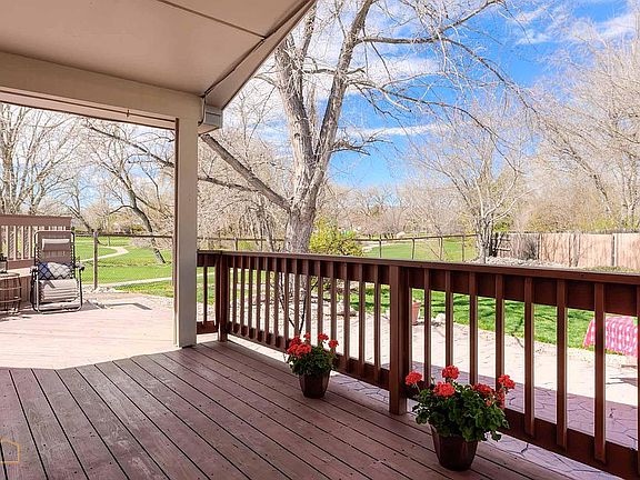 covered OUTDOOR LIVING space right off family room