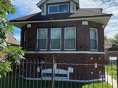 8941 S NORMAL front house sits in front of rear coach house