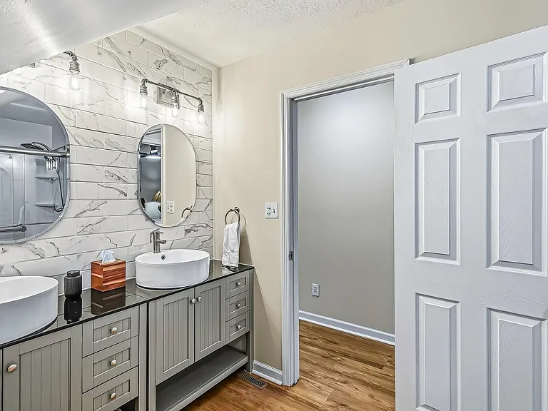 Downstairs bathroom accessible from Bedroom #2