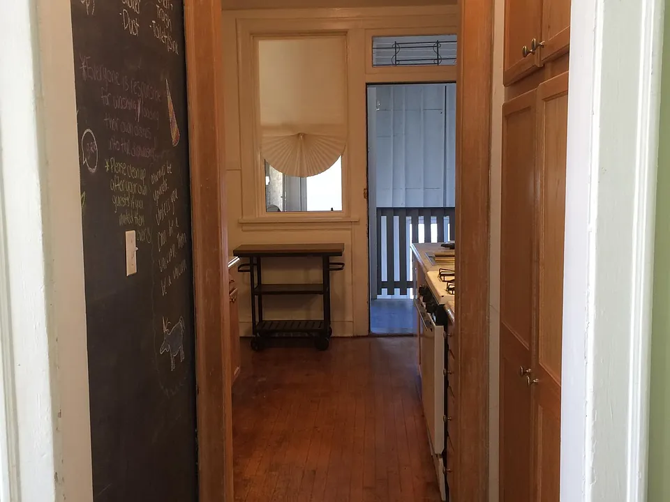 Entryway to the kitchen.... Notice the full pantry cabinets on the right.