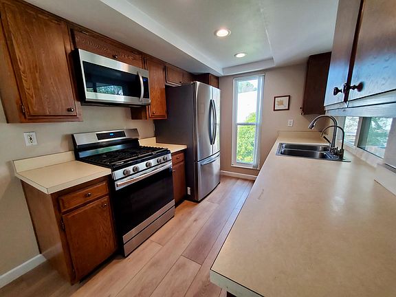 New Samsung appliances - gas range with smart oven (including whole-oven airfrying and dehydrator) and extra large fridge with french doors. The vertical window seen here can be opened for great breezes.