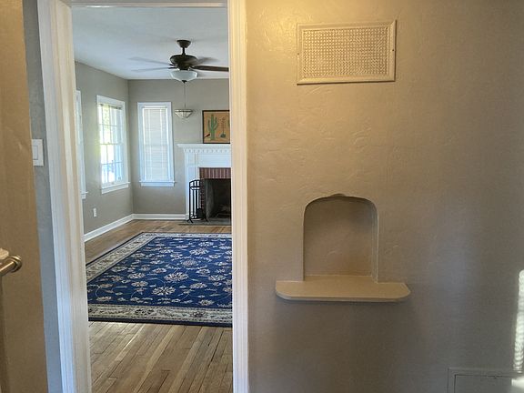 Hallway off of the living room, goes to bedrooms and bathroom.