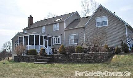 Back Exterior - Screened Porch and Patio
						:
						Set on 2.19 acres, this house has extensive room for outdoor entertainment.