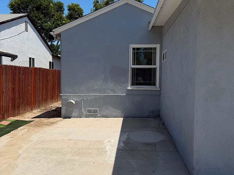 Backyard, area behind bedroom #3