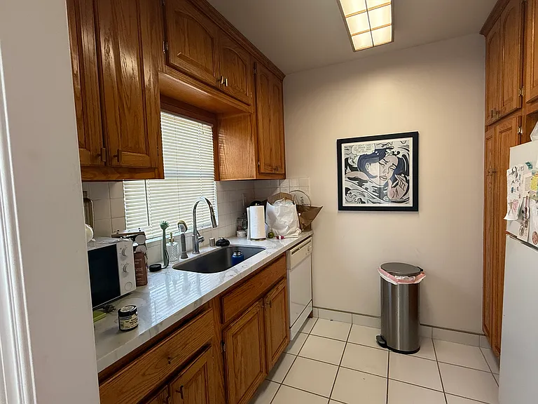 Updated kitchen with gas range, refrigerator and dish washer