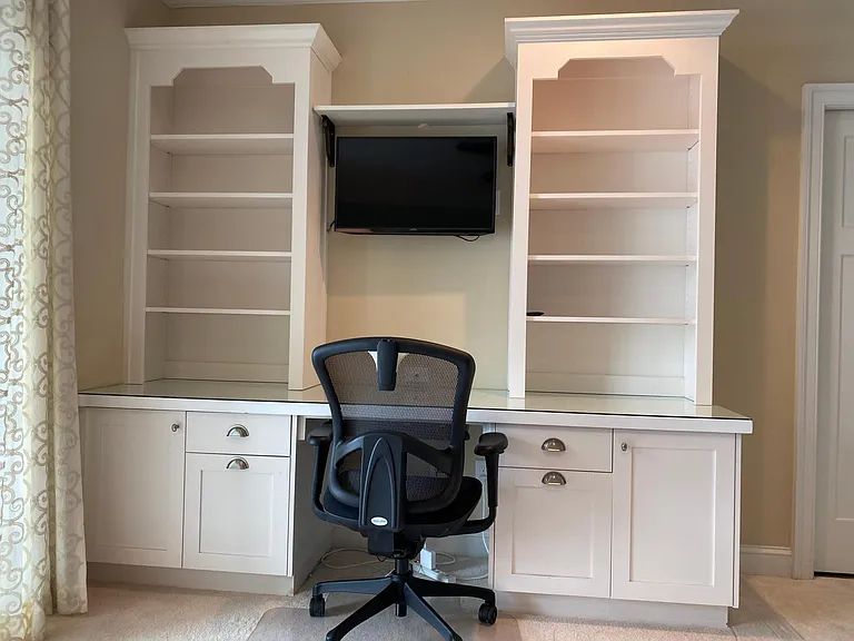 The desk is located in the third bedroom with two Queen beds.