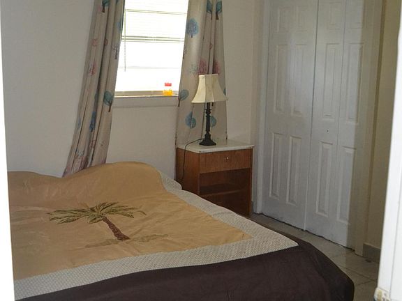 bedroom with queen bed furnished