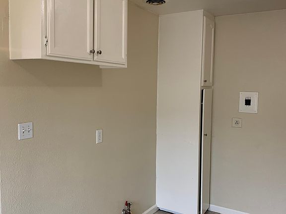 Additional cabinets, gas stove hookup and room for large fridge