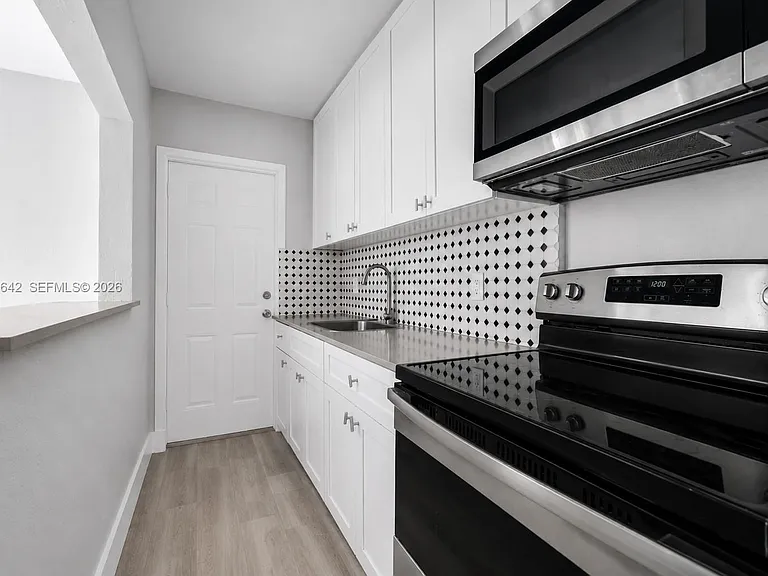6647 SW 59th Pl #102 — Photo 8