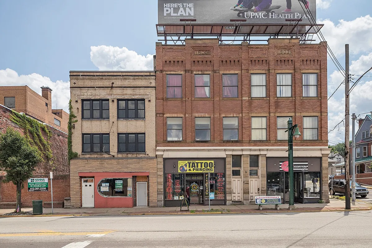 Building Photo - 106 E. 8th Avenue