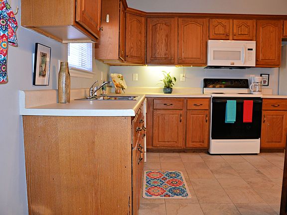 plenty of wood cabinets